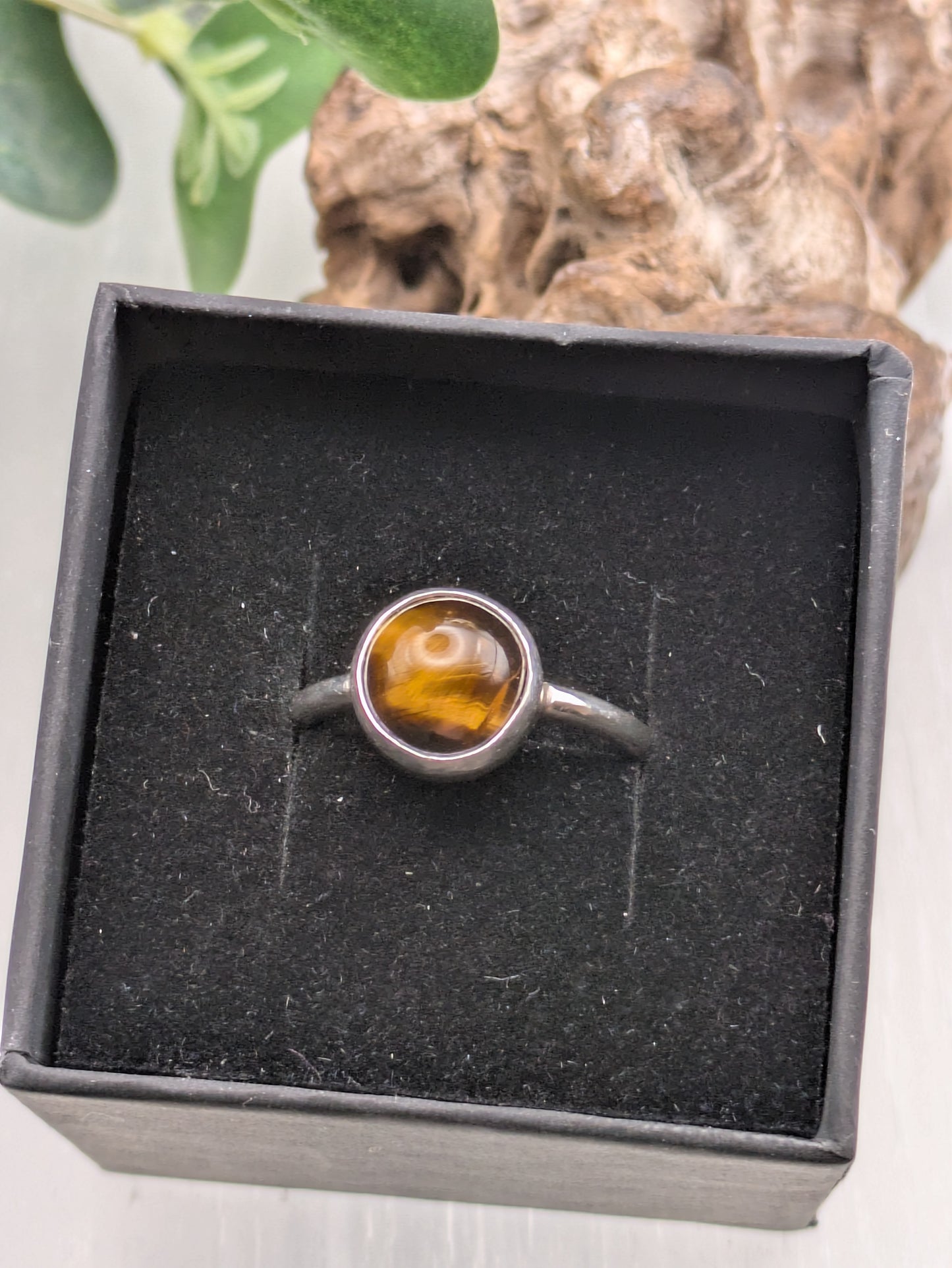 <img src="tigers-eye-ring.jpg" alt="Handmade Tiger's Eye ring in recycled sterling silver, UK size R, a bold crystal healing statement piece for strength and grounding">
