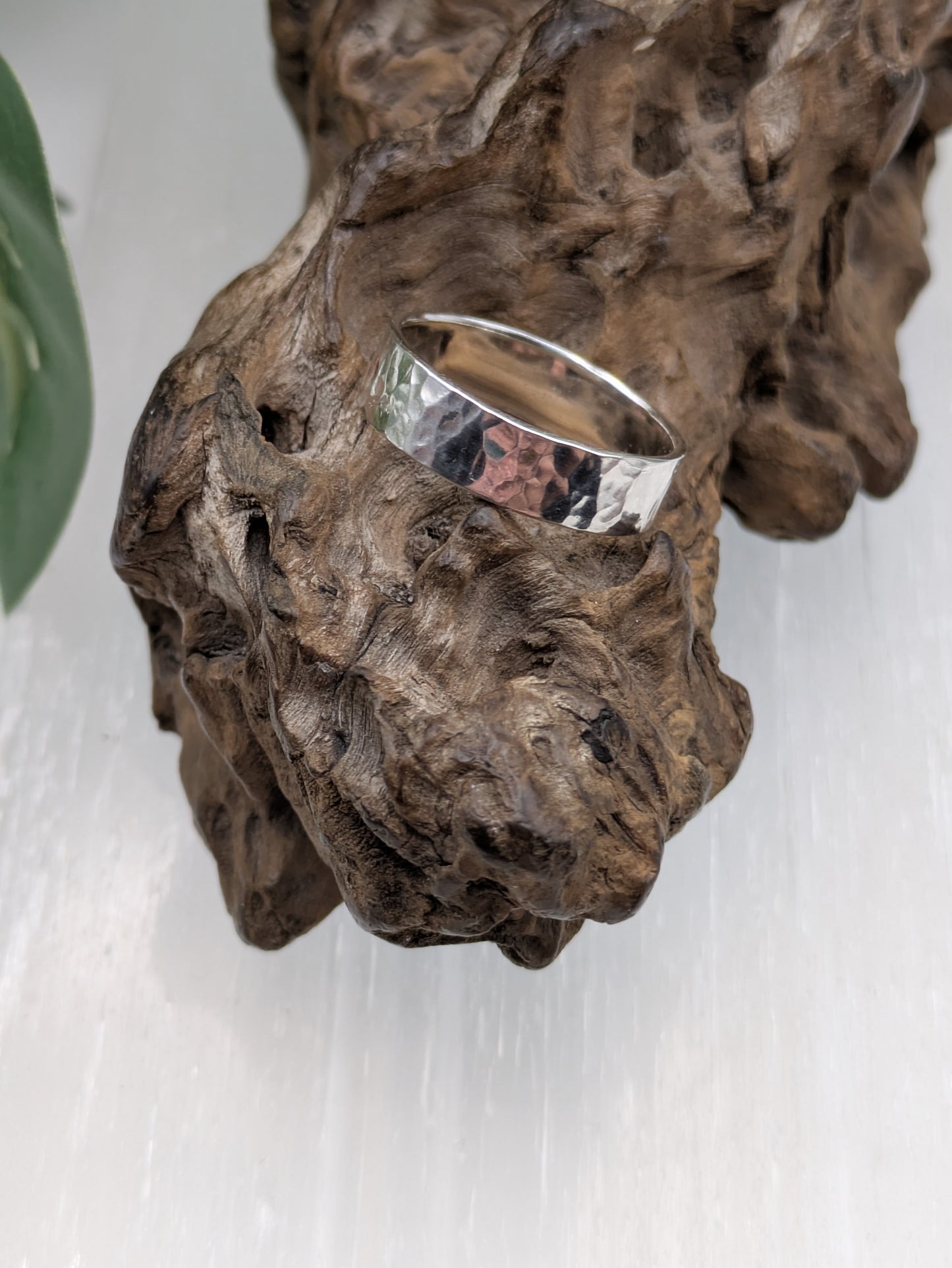 <img src="hammered-silver-ring.jpg" alt="Handcrafted 6mm sterling silver ring with hammered texture, a bold and unique statement band made from recycled 925 silver">
