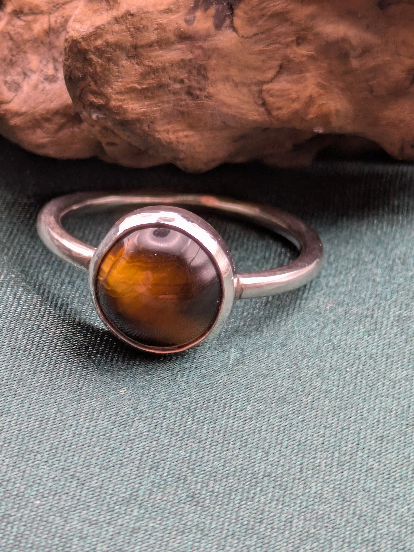 <img src="tigers-eye-ring.jpg" alt="Handmade Tiger's Eye ring in recycled sterling silver, UK size R, a bold crystal healing statement piece for strength and grounding">
