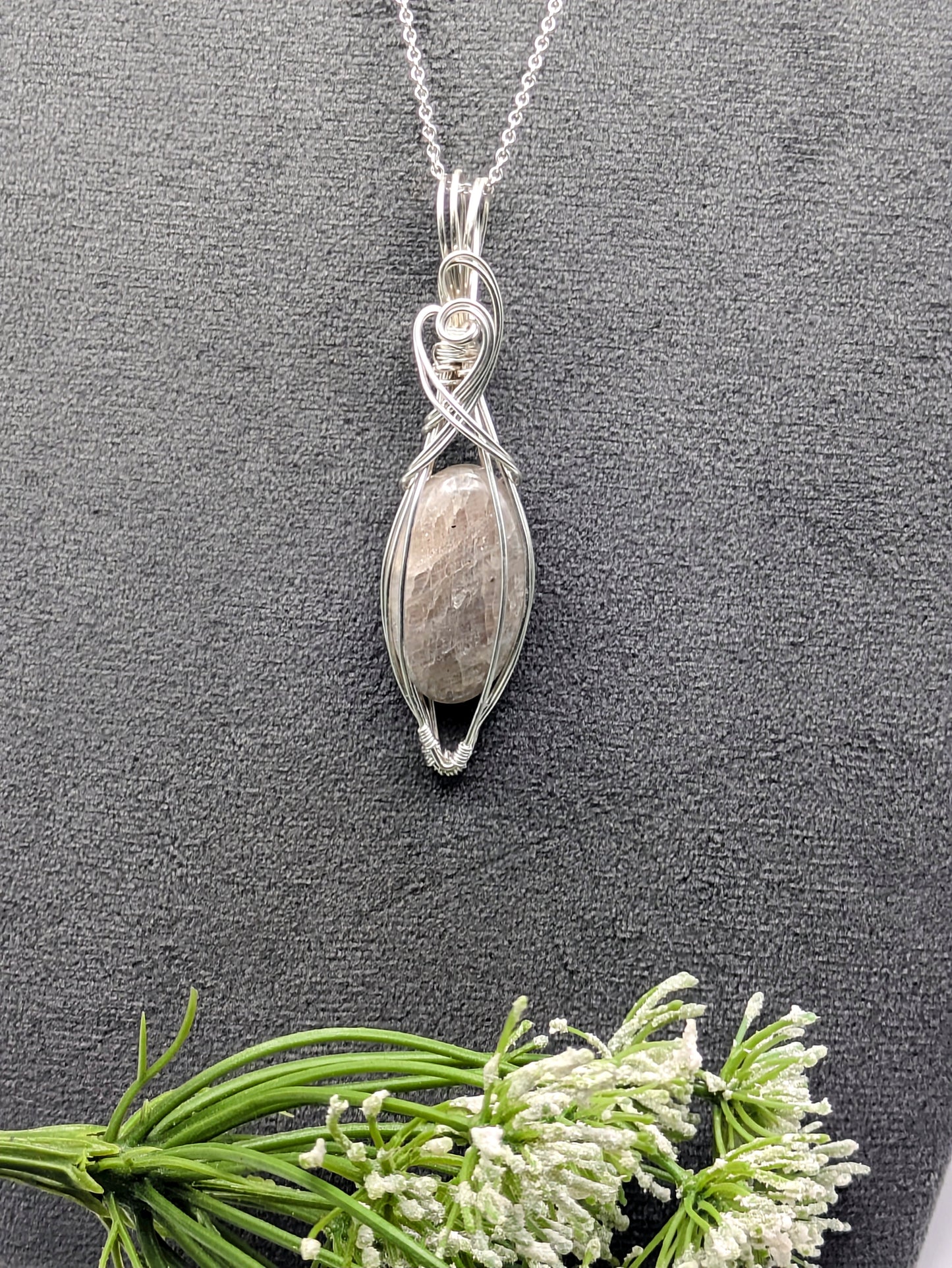 Sterling silver-wrapped belomorite pendant an elegant gift of inner wisdom and radiant energy