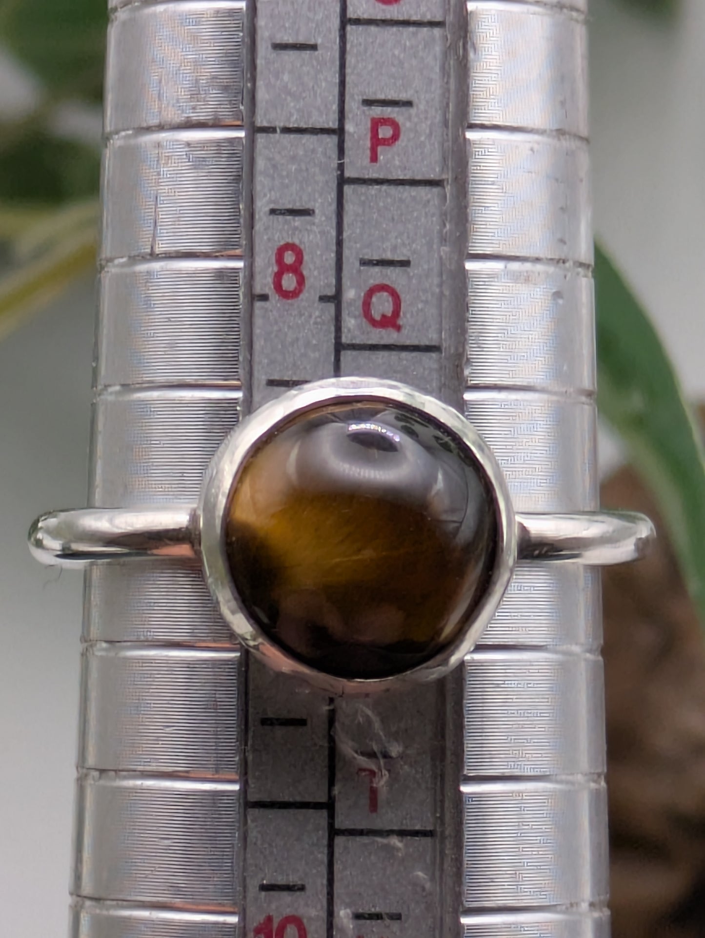 <img src="tigers-eye-ring.jpg" alt="Handmade Tiger's Eye ring in recycled sterling silver, UK size R, a bold crystal healing statement piece for strength and grounding">