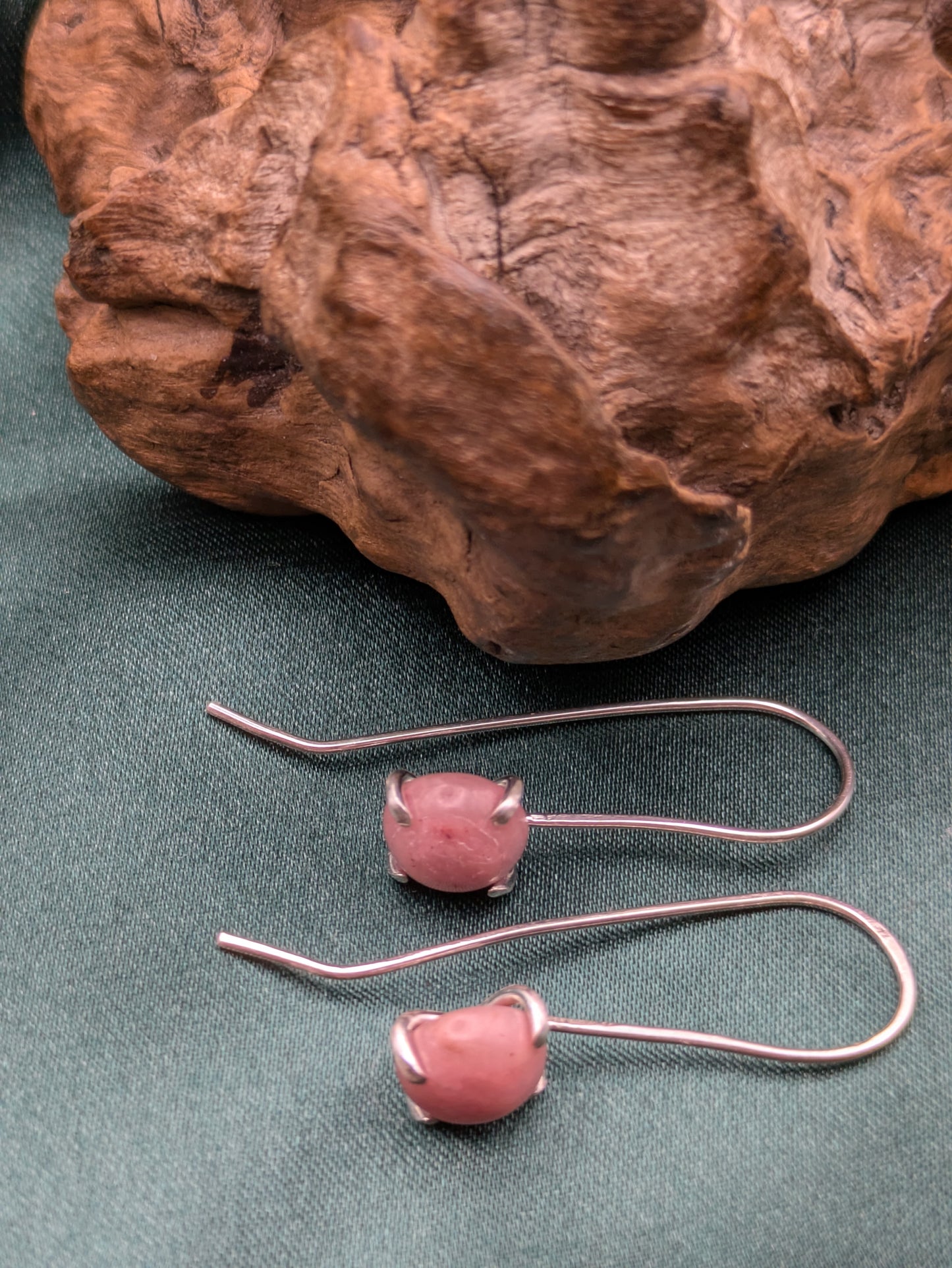 <img src="rhodonite-earrings.jpg" alt="Handmade rhodonite earrings in recycled sterling silver, pink crystal drops for emotional healing and self-love">
