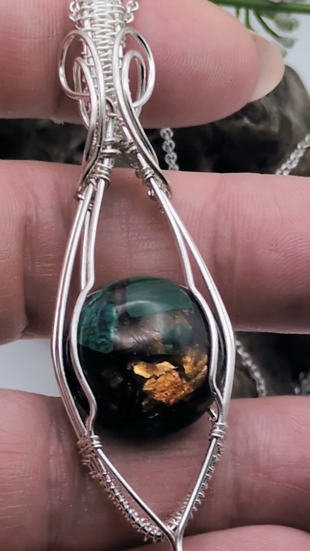 Video of Copper Bornite handmade Sterling silver necklace, showing the beautiful peacock, blues and greens offset by the copper in the gemstone.