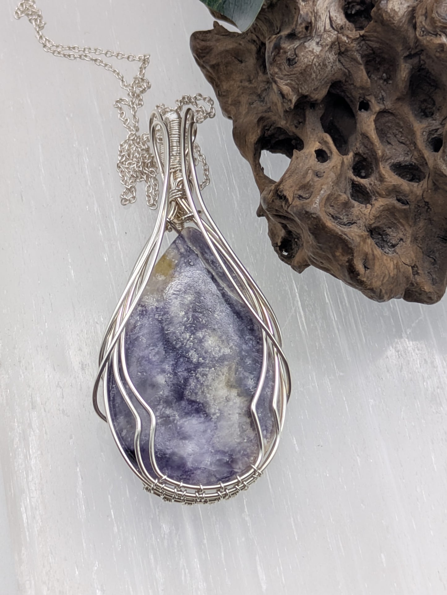 Handcrafted Tiffany Jasper pendant wrapped in sterling silver wire, showcasing earthy purple, cream and brown tones. A nature-inspired design symbolizing emotional balance, grounding energy, and inner strength.