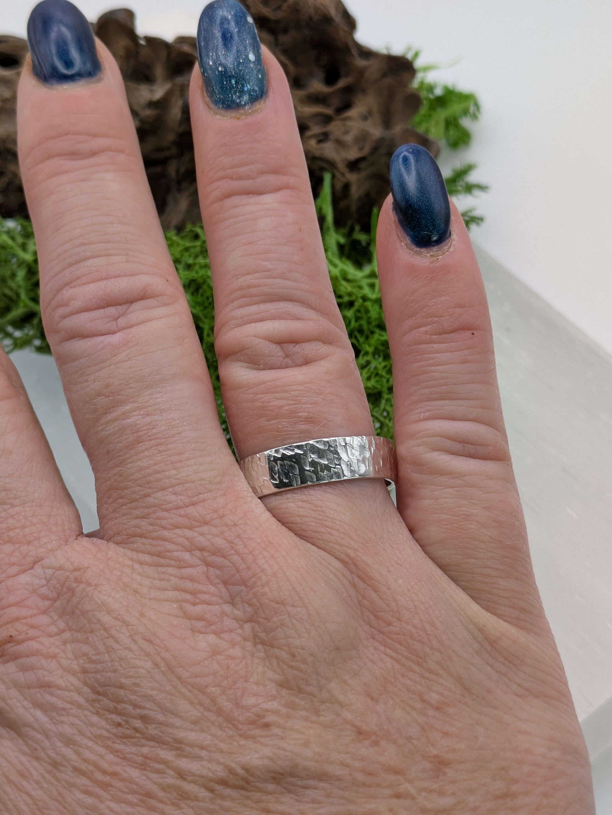 Fully hallmarked Textured Sterling Silver ring on a hand