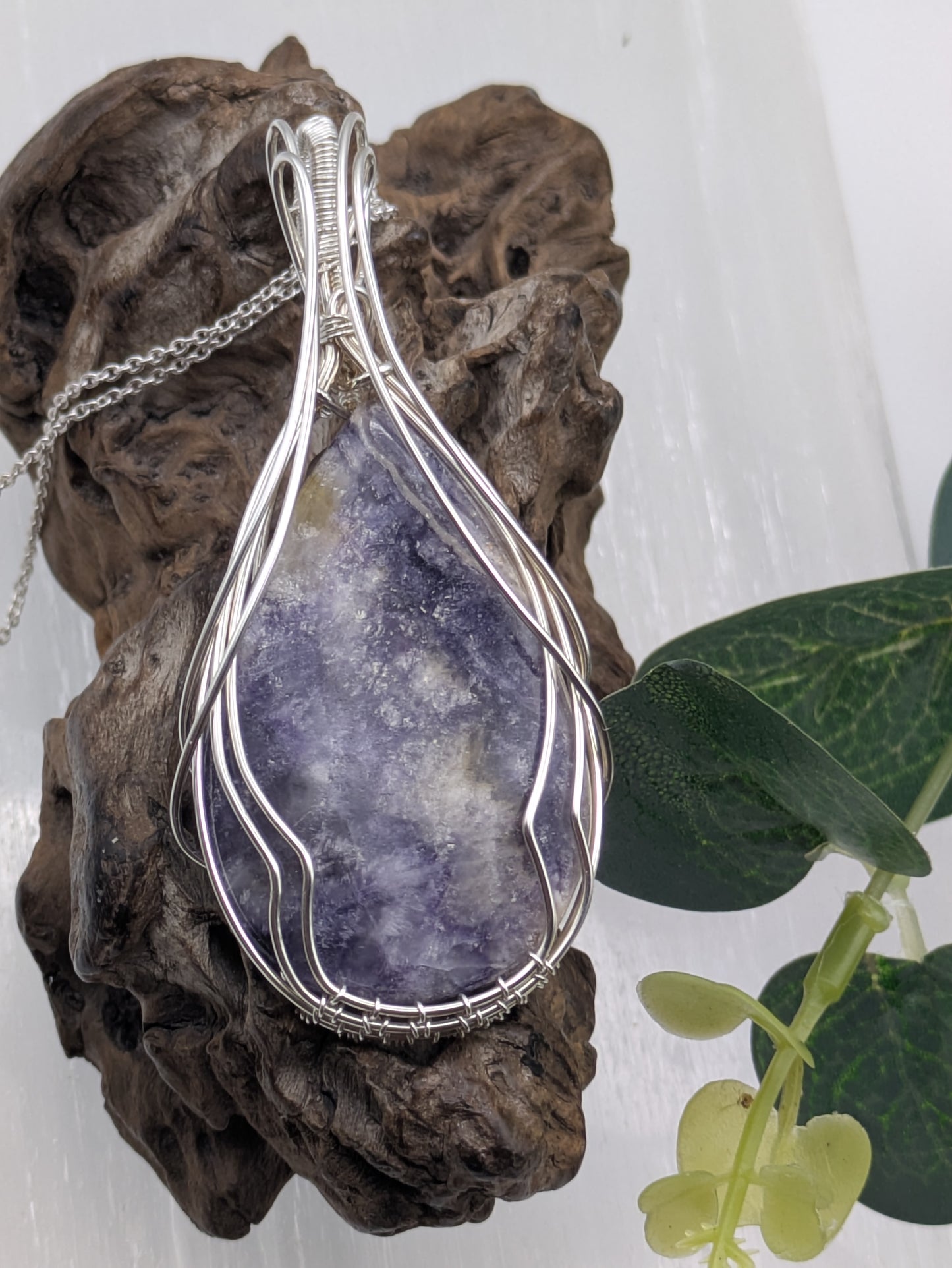 Handcrafted Tiffany Jasper pendant wrapped in sterling silver wire, showcasing earthy purple, cream and brown tones. A nature-inspired design symbolizing emotional balance, grounding energy, and inner strength.