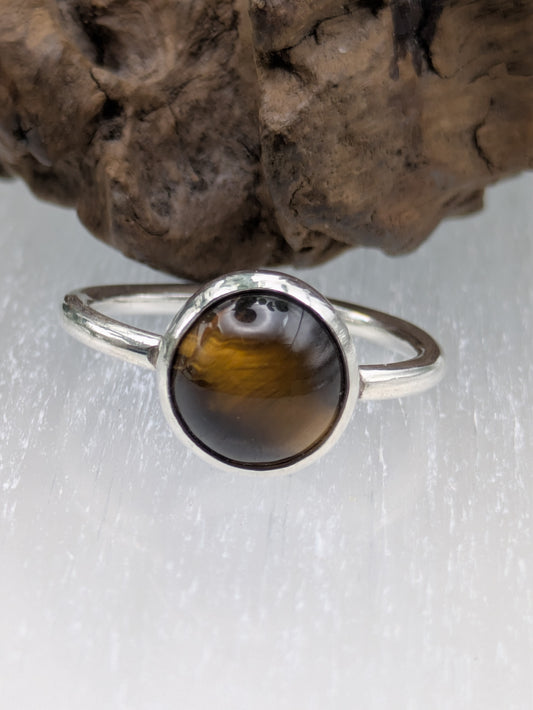 <img src="tigers-eye-ring.jpg" alt="Handmade Tiger's Eye ring in recycled sterling silver, UK size R, a bold crystal healing statement piece for strength and grounding">