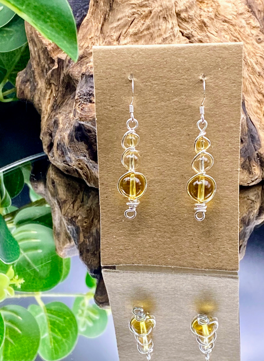 Handmade citrine earrings wrapped in silver healing crystal jewellery with golden warmth